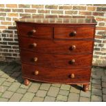 Victorian mahogany veneer bow fronted chest of drawers on turned legs