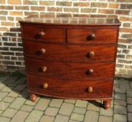 Victorian mahogany veneer bow fronted chest of drawers on turned legs