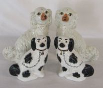 2 pairs of Staffordshire dogs H 30 cm and 22 cm