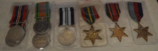 Collection of WWII medals including 2 1939-1945 medals, 2 Defence Medals,