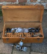 Box containing watch maker's lathe parts