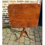 Early 19th century tilt top table with central pedestal and sabre legs