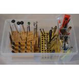 Various useful watchmakers precision hand tools including small screwdrivers,