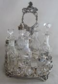 Silver plated and glass cruet set on stand