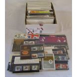 Box of approximately 72 Royal Mail mint presentation stamps & assorted FDCs