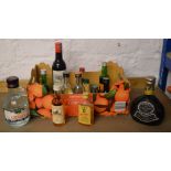 Various alcoholic miniatures including The Famous Grouse, Ouzo,