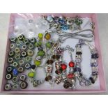 Selection of pandora style charm bracelets and a necklace with extra beads/charms inc silver