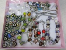 Selection of pandora style charm bracelets and a necklace with extra beads/charms inc silver