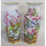Pair of late 19th century hand painted vases of flowers (one with chip to base)
