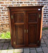 Georgian oak corner cupboard with shaped shelves & dental course to pediment