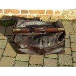 Large late 19th/early 20th century leather Gladstone bag with later pocket added