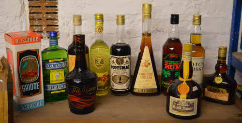 11 bottles of alcoholic drinks including Tia Maria, Scotch Whisky, Cherry Liqueur,