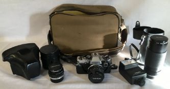 Olympus OM10 SLR 35mm camera with 3 lenses including Hoya zoom & macro,
