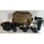 Olympus OM10 SLR 35mm camera with 3 lenses including Hoya zoom & macro,