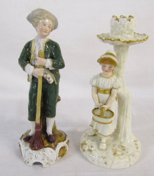 Capodimonte figurine holding a broom H 20 cm and a Royal Worcester figural candlestick (repaired)