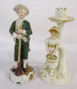 Capodimonte figurine holding a broom H 20 cm and a Royal Worcester figural candlestick (repaired)
