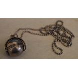 Taxco Italian silver expandable photograph locket on a silver chain,
