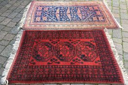 Red Afghan Nahzat rug 157cm by 102cm & a pink & blue Afghan rug 187cm by 110cm