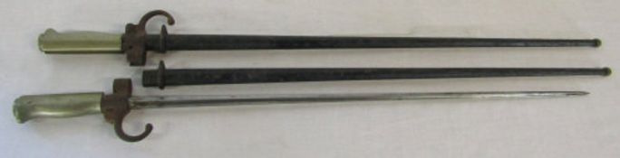 2 spike bayonets with scabbards L 65 cm