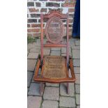 Folding cane seated chair