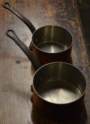 2 heavy copper pans marked Le Gourmet,