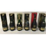 5 bottles of Remy Martin & a bottle of Paulett cognac