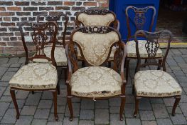6 ornately carved mahogany salon chairs including 2 arm chairs