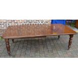 Victorian wind out dining table with 2 leaves on turned legs,