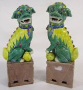 Pair of ceramic Chinese foo dogs H 31 cm