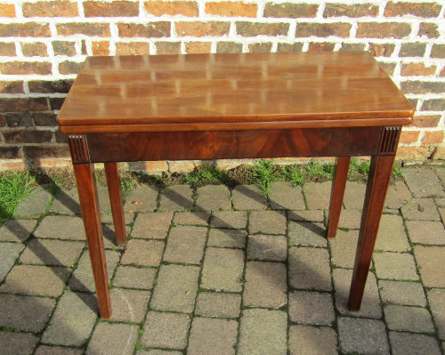 Georgian mahogany foldover breakfast table with ebony stringing