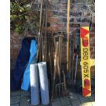 Assorted garden tools, folding chairs,