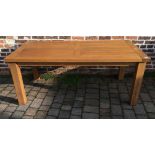 Modern oak dining table with hole in centre for parasol