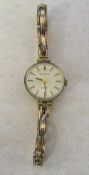 Ladies 9ct gold Everite quartz watch with 9ct gold strap total weight 12.