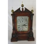 Victorian bracket clock in a walnut case on an inverted breakfront base with Whittington or