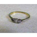 18ct gold and platinum diamond trilogy ring (1 stone missing) size N/O weight 1.