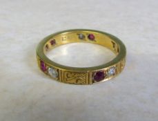 18ct gold band ring with diamonds and rubies (1 diamond missing) size P weight 4.