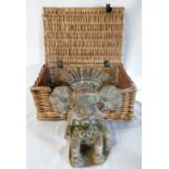 Mexican terracotta figure & a wicker picnic basket