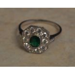 18ct gold emerald and diamond octagonal cluster ring, diamonds approx 0.75ct and emerald 0.