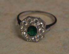 18ct gold emerald and diamond octagonal cluster ring, diamonds approx 0.75ct and emerald 0.