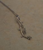 9ct white gold and diamond necklace in the shape of flowers, total approx weight 1.