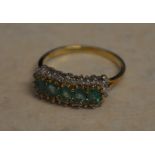 Modern 9ct gold emerald and diamond ring in an older style setting, total approx weight 2.