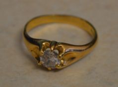 Tested as 18ct gold gents diamond ring in an open claw setting, diamond approx 0.