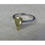 18ct white gold ring set with natural fancy pear brilliant cut yellow 1.
