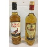 70cl bottle of Grants whisky & a 70cl bottle of Famous Grouse whisky