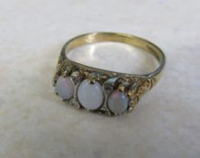 9ct gold three stone opal ring with diamond accents size M weight 2.