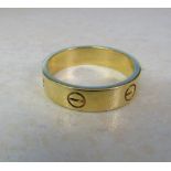 18ct yellow gold gents Cartier screw design ring complete with certificate weight 9.