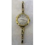 18ct gold ladies Rone wristwatch with 9ct gold strap total weight 18.