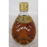 Small bottle of 'Dimple' whisky H 17 cm