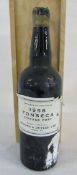 Boxed bottle of 1958 Fonseca Vintage Port shipped and bottled by Hedges & Butler Ltd London (damage