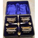 4 piece silver salts with spoons, near matched set, no liners, Birmingham & Chester 1899,